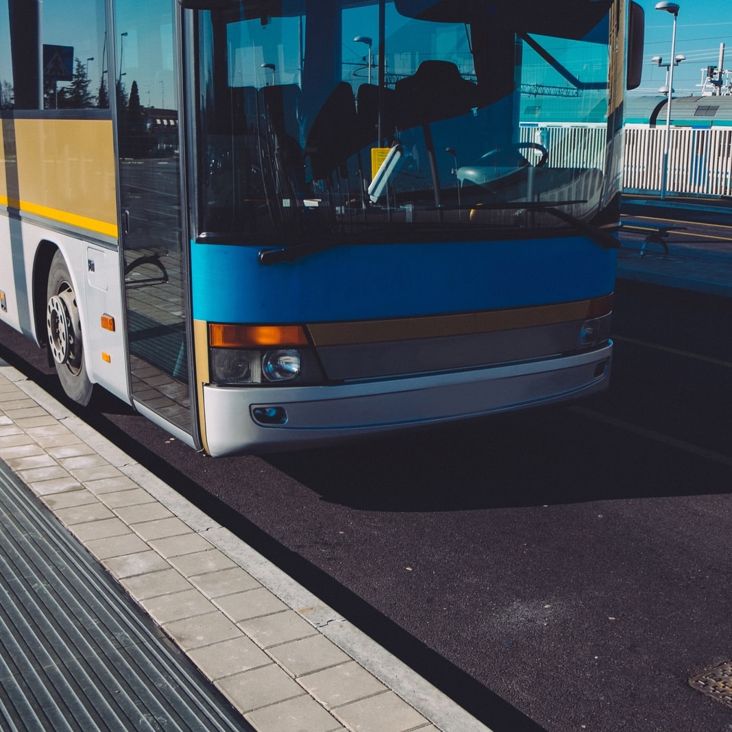 Blue bus at a bus station